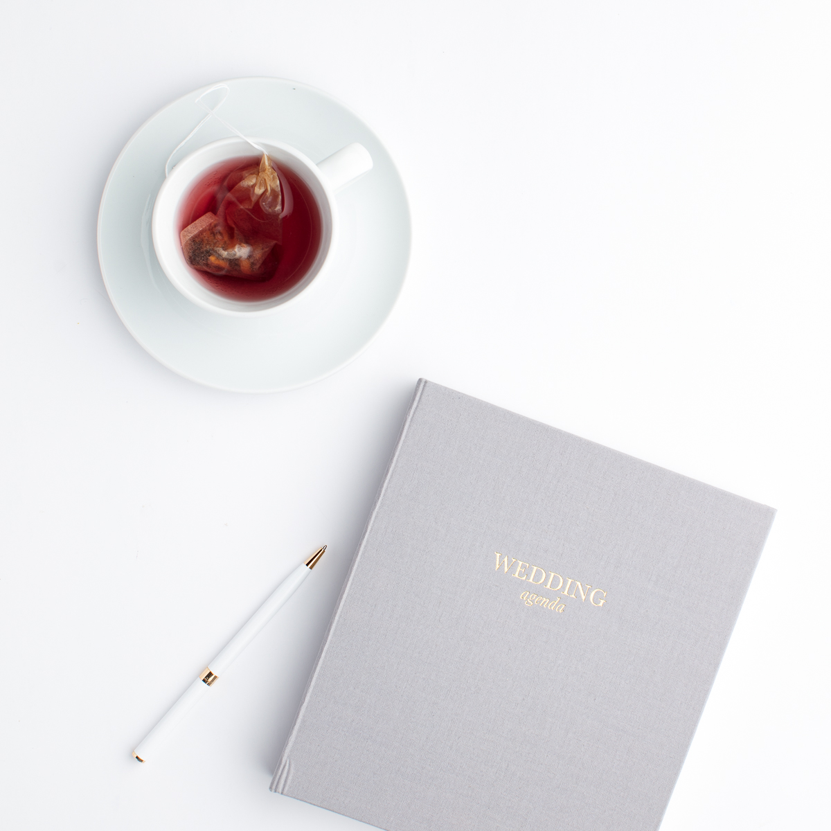 wedding planner agenda with a cup of tea