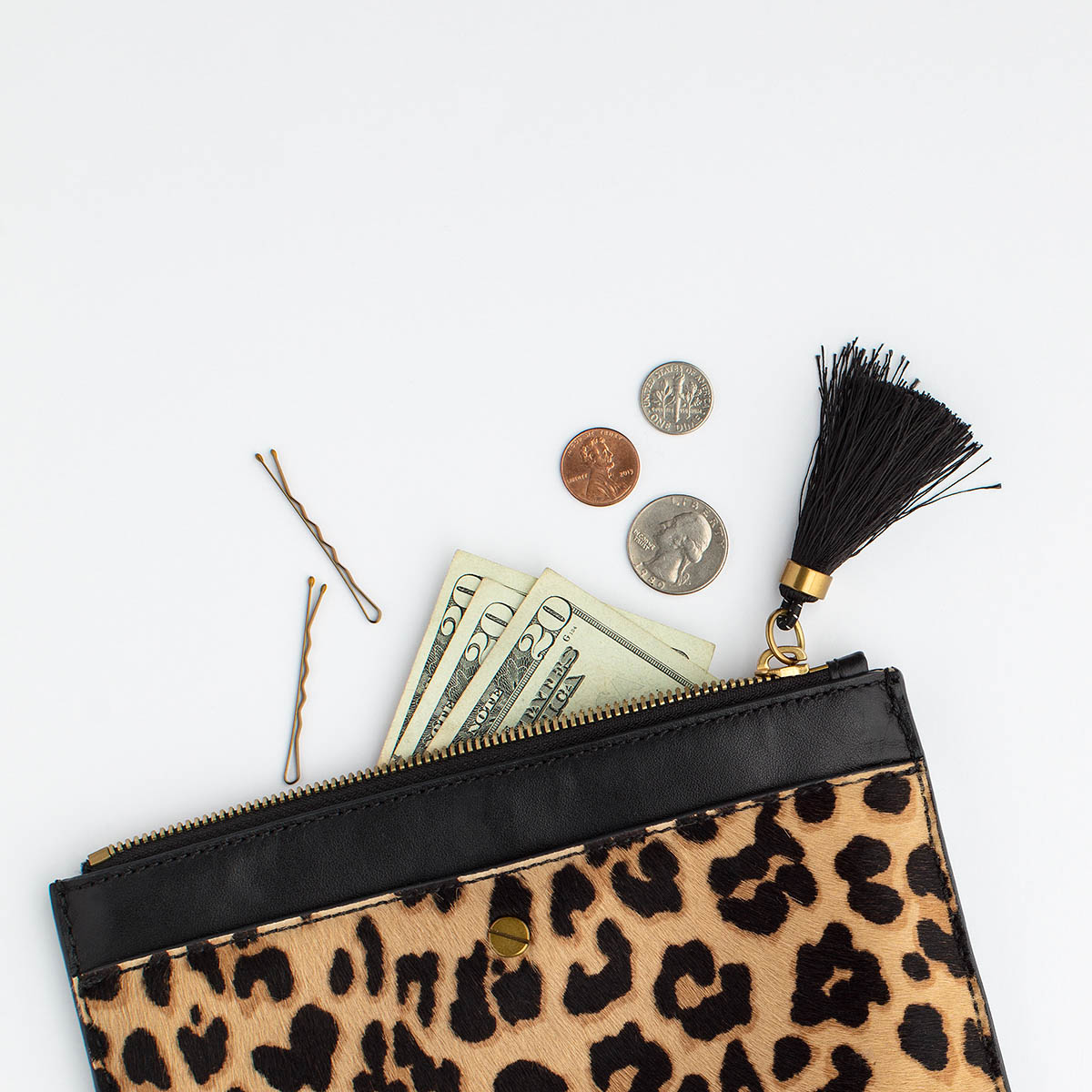 Money in a Cheetah print purse, How to Make Your Website Convert | Alyssa Brooke Studios